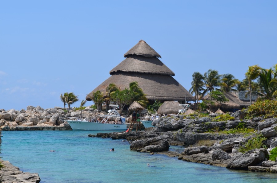 Aerial view of the lagoon and palapas at Xcaret park